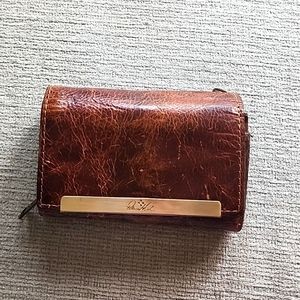 Gently used genuine leather Patricia Nash wallet in natural brown